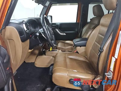 Zdjęcie 7 z 13 samochodu: 2011 JEEP WRANGLER UNLIMITED SAHARA VIN:1J4HA5H11BL542536 - miniatura
