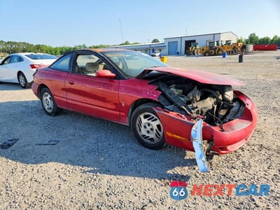 Czwarte zdjęcie samochodu z boku: 1999 SATURN SC2 VIN:1G8ZH1277XZ155256 - miniatura