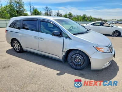 Czwarte zdjęcie samochodu z boku: 2011 HONDA ODYSSEY EXL VIN:5FNRL5H60BB060353 - miniatura