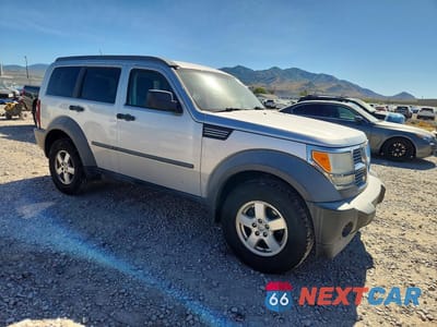 Czwarte zdjęcie samochodu z boku: 2007 DODGE NITRO SXT VIN:1D8GU28KX7W528786 - miniatura
