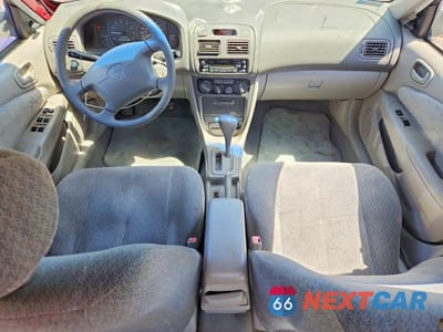 Zdjęcie 8 z 12 samochodu: 2001 TOYOTA COROLLA LE VIN:1NXBR12E01Z465980 - miniatura