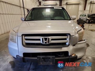 Piąte zdjęcie samochodu w środku: 2007 HONDA PILOT EXL VIN:2HKYF18627H507401 - miniatura