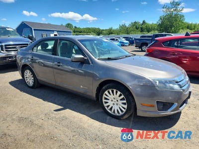 Czwarte zdjęcie samochodu z boku: 2011 FORD FUSION HYBRID VIN:3FADP0L36BR146348 - miniatura