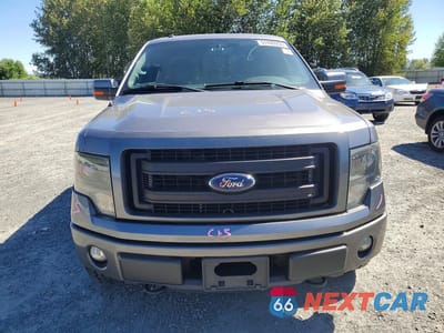 Piąte zdjęcie samochodu w środku: 2014 FORD F150 SUPERCREW VIN:1FTFW1EF6EKE49013 - miniatura