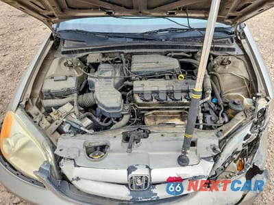 Zdjęcie 11 z 12 samochodu: 2002 HONDA CIVIC LX VIN:1HGEM22512L003250 - miniatura