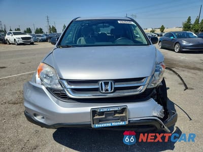 Piąte zdjęcie samochodu w środku: 2011 HONDA CR-V SE VIN:JHLRE3H40BC012381 - miniatura