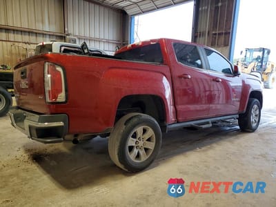Trzecie zdjęcie samochodu z tyłu: 2016 GMC CANYON SLE VIN:1GTG5CE32G1349606 - miniatura