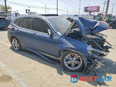 Czwarte zdjęcie samochodu z boku: 2020 BMW X3 SDRIVE30I VIN:5UXTY3C04LLU70178 - miniatura