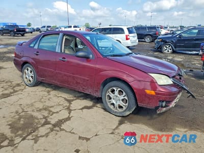 Czwarte zdjęcie samochodu z boku: 2007 FORD FOCUS VIN:1FAHP34N37W352315 - miniatura