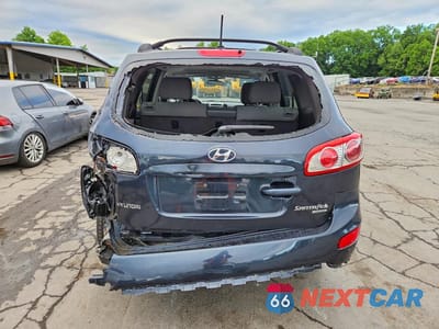 Zdjęcie 6 z 13 samochodu: 2010 HYUNDAI SANTA FE GLS VIN:5NMSGDAB6AH412887 - miniatura