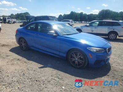 Czwarte zdjęcie samochodu z boku: 2016 BMW M235I VIN:WBA1J7C52GV289815 - miniatura