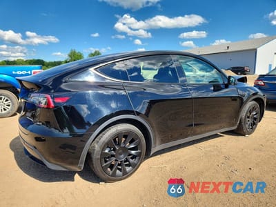 Trzecie zdjęcie samochodu z tyłu: 2023 TESLA MODEL Y VIN:7SAYGDEE3PA026064 - miniatura