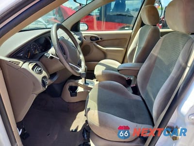 Zdjęcie 7 z 12 samochodu: 2002 FORD FOCUS ZX5 VIN:3FAFP37342R166022 - miniatura