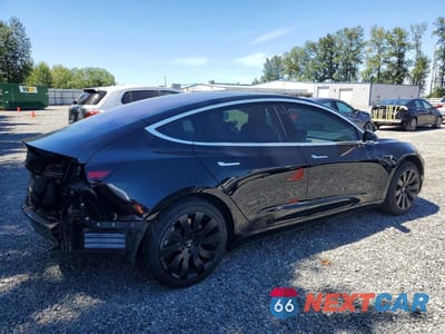 Trzecie zdjęcie samochodu z tyłu: 2018 TESLA MODEL 3 VIN:5YJ3E1EA6JF013912 - miniatura