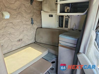 Zdjęcie 6 z 10 samochodu: 2016 VOLVO VNL SEMI TRUCK VIN:4V4NC9EH7GN934710 - miniatura