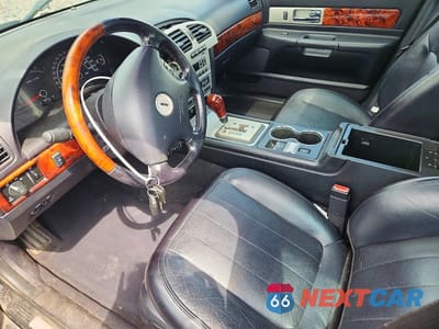 Zdjęcie 7 z 14 samochodu: 2003 LINCOLN LS VIN:1LNHM87AX3Y694055 - miniatura