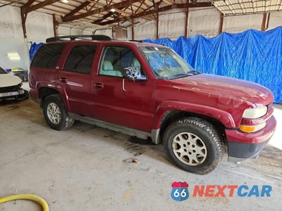 Czwarte zdjęcie samochodu z boku: 2004 CHEVROLET TAHOE K1500 VIN:1GNEK13ZX4R155227 - miniatura