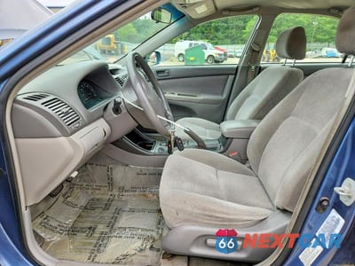 Zdjęcie 7 z 12 samochodu: 2003 TOYOTA CAMRY LE VIN:4T1BE32K33U230876 - miniatura