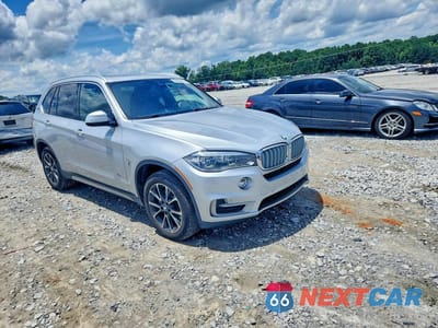 Czwarte zdjęcie samochodu z boku: 2018 BMW X5 XDR40E VIN:5UXKT0C52J0W02423 - miniatura