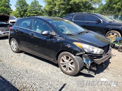 Czwarte zdjęcie samochodu z boku: 2013 HYUNDAI ELANTRA GT BASE VIN:KMHD35LE8DU090991 - miniatura