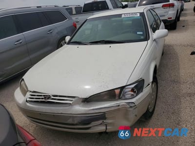 Piąte zdjęcie samochodu w środku: 1999 TOYOTA CAMRY LE VIN:JT2BG28K7X0350945 - miniatura