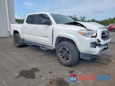 Czwarte zdjęcie samochodu z boku: 2017 TOYOTA TACOMA SR5 V6 VIN:3TMAZ5CN1HM030731 - miniatura