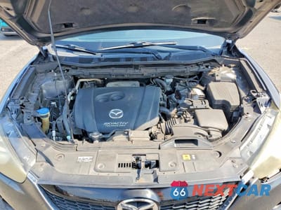 Zdjęcie 12 z 13 samochodu: 2014 MAZDA CX-5 TOURING VIN:JM3KE2CY3E0402617 - miniatura