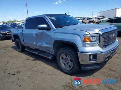 Czwarte zdjęcie samochodu z boku: 2014 GMC SIERRA K1500 SLT VIN:3GTU2VEC1EG130318 - miniatura