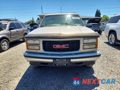 Piąte zdjęcie samochodu w środku: 1999 GMC YUKON VIN:1GKEK13R0XJ734825 - miniatura