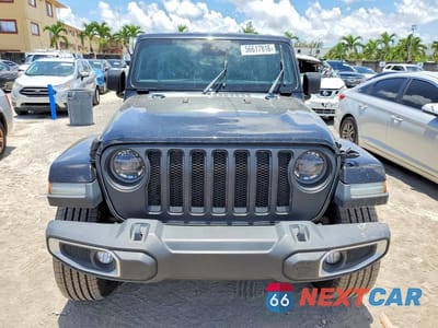 Piąte zdjęcie samochodu w środku: 2019 JEEP WRANGLER UNLIMITED SAHARA VIN:1C4HJXEG6KW583060 - miniatura