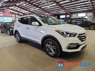 Czwarte zdjęcie samochodu z boku: 2018 HYUNDAI SANTA FE SPORT 2.4L VIN:5XYZUDLB1JG556569 - miniatura