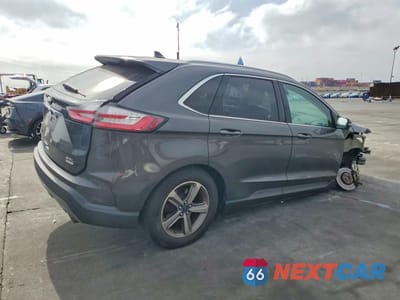 Trzecie zdjęcie samochodu z tyłu: 2020 FORD EDGE SEL VIN:2FMPK3J95LBB18292 - miniatura