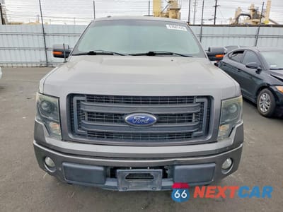 Piąte zdjęcie samochodu w środku: 2013 FORD F150 SUPERCREW VIN:1FTFW1CTXDKG23141 - miniatura