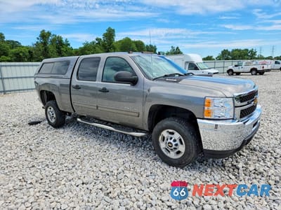 Czwarte zdjęcie samochodu z boku: 2014 CHEVROLET SILVERADO K2500 HEAVY DUTY LT VIN:1GC1KXCG9EF149592 - miniatura