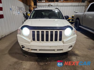 Piąte zdjęcie samochodu w środku: 2010 JEEP COMPASS SPORT VIN:1J4NT4FA8AD506863 - miniatura