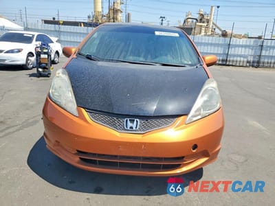 Piąte zdjęcie samochodu w środku: 2011 HONDA FIT SPORT VIN:JHMGE8H67BS008755 - miniatura