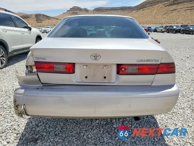 Zdjęcie 6 z 12 samochodu: 1999 TOYOTA CAMRY LE VIN:4T1BG22KXXU418370 - miniatura