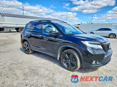 Czwarte zdjęcie samochodu z boku: 2021 HONDA PASSPORT ELITE VIN:5FNYF8H06MB000564 - miniatura