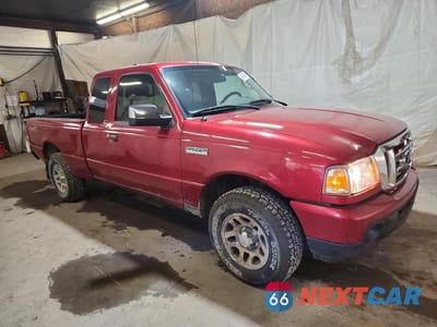 Czwarte zdjęcie samochodu z boku: 2011 FORD RANGER SUPER CAB VIN:1FTLR4FE1BPB19974 - miniatura