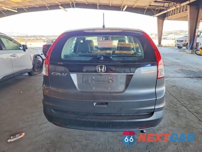 Zdjęcie 6 z 12 samochodu: 2013 HONDA CR-V LX VIN:5J6RM3H32DL031275 - miniatura