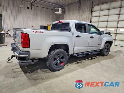 Trzecie zdjęcie samochodu z tyłu: 2018 CHEVROLET COLORADO LT VIN:1GCGTCEN6J1126015 - miniatura