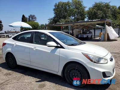 Czwarte zdjęcie samochodu z boku: 2013 HYUNDAI ACCENT GLS VIN:KMHCT4AE2DU434341 - miniatura