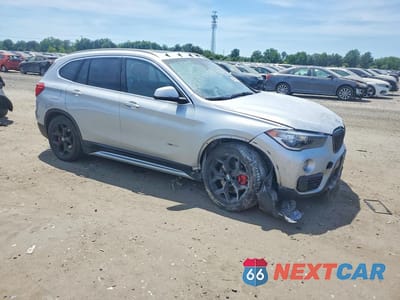 Czwarte zdjęcie samochodu z boku: 2018 BMW X1 XDRIVE28I VIN:WBXHT3C36J5K22051 - miniatura