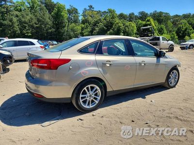 Trzecie zdjęcie samochodu z tyłu: 2015 FORD FOCUS SE VIN:1FADP3F29FL303976 - miniatura