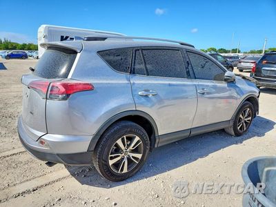 Trzecie zdjęcie samochodu z tyłu: 2018 TOYOTA RAV4 XLE VIN:JTMWFREV9JD133075 - miniatura