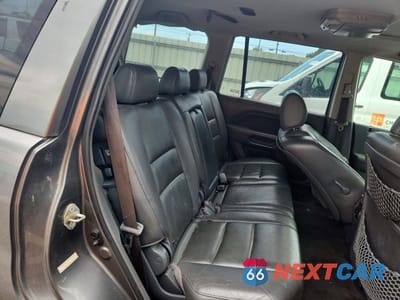 Zdjęcie 11 z 14 samochodu: 2007 HONDA PILOT EXL VIN:2HKYF18567H527321 - miniatura