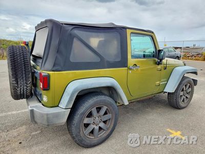 Trzecie zdjęcie samochodu z tyłu: 2010 JEEP WRANGLER SPORT VIN:1J4AA2D16AL207681 - miniatura
