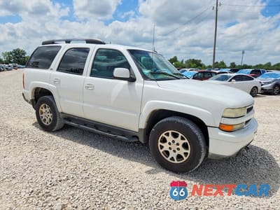 Czwarte zdjęcie samochodu z boku: 2002 CHEVROLET TAHOE K1500 VIN:1GNEK13Z02R297261 - miniatura