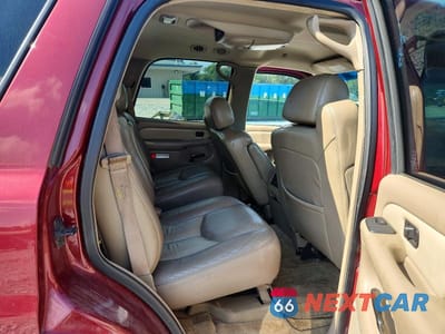 Zdjęcie 11 z 13 samochodu: 2003 GMC YUKON DENALI VIN:1GKEK63U13J246236 - miniatura
