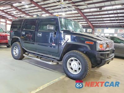 Czwarte zdjęcie samochodu z boku: 2006 HUMMER H2 VIN:5GRGN23U06H119962 - miniatura